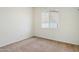 Spacious bedroom with neutral walls and carpeted floors at 7138 E Laguna Azul Ave, Mesa, AZ 85209