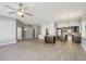 Modern kitchen with dark wood cabinets and an island at 7138 E Laguna Azul Ave, Mesa, AZ 85209