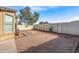 Landscaped backyard with patio and partial view of the house at 7419 S 31St Dr, Phoenix, AZ 85041