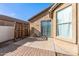 Landscaped backyard with patio and partial view of the house at 7419 S 31St Dr, Phoenix, AZ 85041