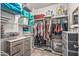 Well-organized closet with ample shelving and hanging space at 7419 S 31St Dr, Phoenix, AZ 85041