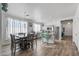 Dining area with a dark grey table and six chairs at 7419 S 31St Dr, Phoenix, AZ 85041