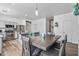 Dining area with a grey table and teal chairs at 7419 S 31St Dr, Phoenix, AZ 85041