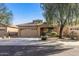 One-story house with attached garage and landscaped front yard at 7419 S 31St Dr, Phoenix, AZ 85041