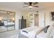 Bright bedroom with mirrored closet doors and neutral decor at 8413 N 55Th Ave, Glendale, AZ 85302