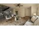 Living room with gray sofa, gold coffee table, and a staircase at 8413 N 55Th Ave, Glendale, AZ 85302