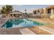 Community swimming pool with lounge chairs at 8413 N 55Th Ave, Glendale, AZ 85302