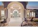 Elegant entryway with arched doorway and columns at 9020 N Flying Butte --, Fountain Hills, AZ 85268