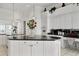 Large kitchen featuring a sizable granite island and white cabinetry at 9020 N Flying Butte --, Fountain Hills, AZ 85268