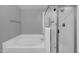 Bathroom features a shower and a large soaking tub at 955 E Knox Rd # 110, Chandler, AZ 85225