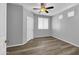 Well-lit bedroom with wood-look floors and ceiling fan at 955 E Knox Rd # 110, Chandler, AZ 85225