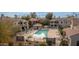 Community pool with ample lounge chairs and covered seating at 955 E Knox Rd # 110, Chandler, AZ 85225