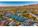 Aerial view of community amenities including pool and tennis courts at 9690 N 117Th Way, Scottsdale, AZ 85259