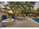 Inviting backyard with a firepit, spa, and refreshing pool, perfect for relaxation at 9690 N 117Th Way, Scottsdale, AZ 85259