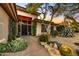 Pathway leads to the front entrance, showcasing the home's exterior and landscaping at 9690 N 117Th Way, Scottsdale, AZ 85259