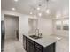 Kitchen island with granite countertop and double sink at 10031 E Gamma Ave, Mesa, AZ 85212