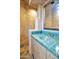 Upscale bathroom features a teal tile vanity, large mirror, and a walk-in shower at 10040 E Happy Valley Rd # 1047, Scottsdale, AZ 85255
