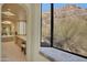 Spa-like bathroom with large window and mountain views at 10040 E Happy Valley Rd # 1047, Scottsdale, AZ 85255