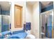 Bathroom with blue tile, a shower, and a single sink vanity at 10040 E Happy Valley Rd # 1047, Scottsdale, AZ 85255