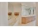 Spa-like bathroom with double sinks, a large vanity, and a soaking tub at 10040 E Happy Valley Rd # 1047, Scottsdale, AZ 85255
