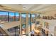 Open dining area with stunning views and a pool at 10040 E Happy Valley Rd # 1047, Scottsdale, AZ 85255