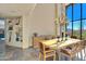 Spacious dining area with built-in shelving and large windows at 10040 E Happy Valley Rd # 1047, Scottsdale, AZ 85255
