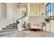 Elegant entryway with curved staircase and stone tile flooring at 10040 E Happy Valley Rd # 1047, Scottsdale, AZ 85255