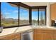 Kitchen features stunning mountain views from the sink at 10040 E Happy Valley Rd # 1047, Scottsdale, AZ 85255