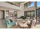 Spacious living room with fireplace and high ceilings at 10040 E Happy Valley Rd # 1047, Scottsdale, AZ 85255