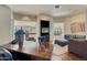 Home office with a large desk, built-in shelving, and views of the surrounding mountains at 10040 E Happy Valley Rd # 1047, Scottsdale, AZ 85255