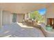 Covered patio features a built-in grill, fireplace, and flagstone flooring at 10040 E Happy Valley Rd # 1047, Scottsdale, AZ 85255