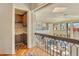 Convenient wet bar with wood cabinetry and tile backsplash at 10040 E Happy Valley Rd # 1047, Scottsdale, AZ 85255