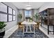 Modern farmhouse dining room with white table and wood chairs at 10221 S Bickwell Trl, Apache Junction, AZ 85120