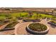 Circular dog park with benches and landscaping at 10221 S Bickwell Trl, Apache Junction, AZ 85120