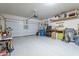 Garage with shelving, tools, and storage at 10421 E Cliffrose Ln, Florence, AZ 85132