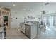 Island kitchen with granite countertops and stainless steel appliances at 10421 E Cliffrose Ln, Florence, AZ 85132