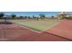 Community tennis and pickleball courts with shaded seating at 10421 E Cliffrose Ln, Florence, AZ 85132