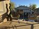 Private balcony with two wicker chairs and city view at 1069 N 84Th Pl, Scottsdale, AZ 85257