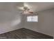 Spacious bedroom with ceiling fan and wood-look flooring at 1069 N 84Th Pl, Scottsdale, AZ 85257