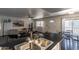 Kitchen with stainless steel sink and breakfast bar at 1069 N 84Th Pl, Scottsdale, AZ 85257
