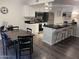 Modern kitchen with stainless steel appliances and breakfast bar at 1069 N 84Th Pl, Scottsdale, AZ 85257