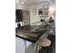 Kitchen features a breakfast bar with seating for three at 1069 N 84Th Pl, Scottsdale, AZ 85257