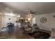 Open living area features hardwood floors and kitchen access at 1069 N 84Th Pl, Scottsdale, AZ 85257