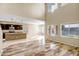 Open living room and kitchen area with high ceilings at 10789 W Saddlehorn Rd, Peoria, AZ 85383