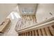View from upstairs looking down the staircase into living area at 10789 W Saddlehorn Rd, Peoria, AZ 85383
