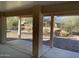 Covered patio overlooks a desert landscape backyard at 1120 S 232Nd Ave, Buckeye, AZ 85326