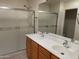 Double vanity bathroom with large shower and tile flooring at 1120 S 232Nd Ave, Buckeye, AZ 85326