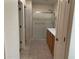Bathroom with double vanity, shower, and tile flooring at 1120 S 232Nd Ave, Buckeye, AZ 85326