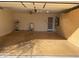 Garage has built-in storage cabinets and epoxy flooring at 1120 S 232Nd Ave, Buckeye, AZ 85326