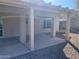 Covered patio with concrete flooring and view of backyard at 1120 S 232Nd Ave, Buckeye, AZ 85326